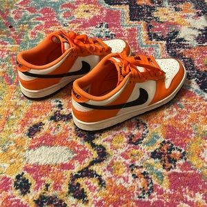 orange black and white nike dunks